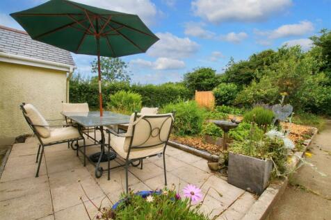 Patio to rear of overflow accommodation