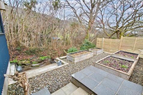 Raised beds and small stream