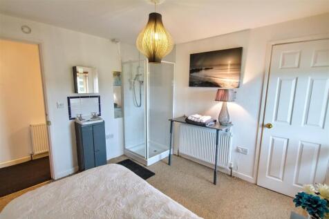 Bedroom 3 with shower and sink