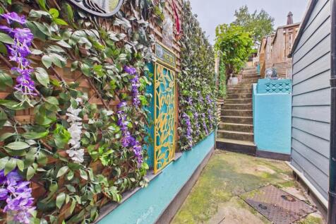 Side Courtyard To Garden