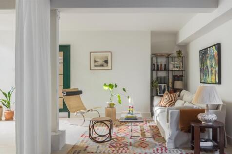 : Comfy shared living room, with monthly events
