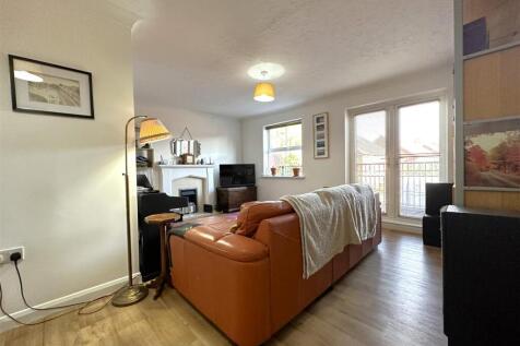 Living Room With French Doors Onto Balcony 955