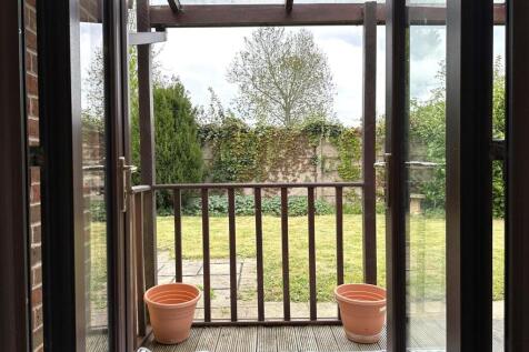 French Doors Onto Seating Canopy 136