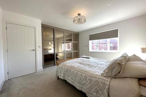 Bedroom One With Fitted Wardrobes 165