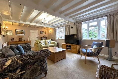 Generous Beamed Living Room 311