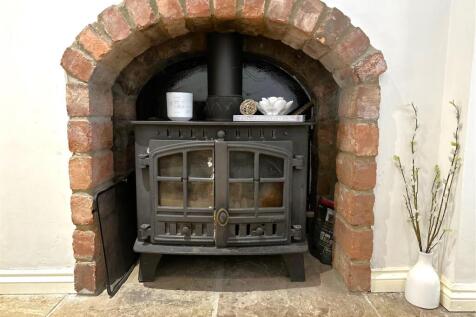 Exposed Fireplace With Log Burner 654