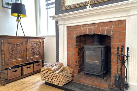 Exposed Feature Fireplace With Log Burner 920