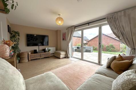 Sizeable Living Room Onto Patio 780