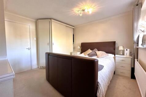 Bedroom One With Fitted Wardrobes 307