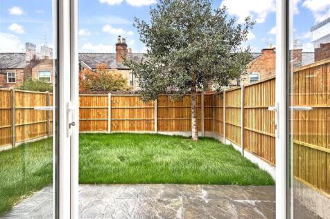 French Doors Out To Paved Seating Area 520