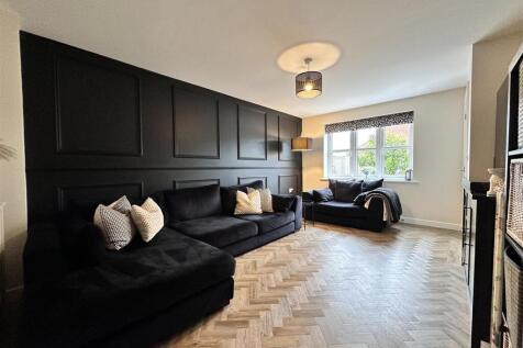 Generous Living Room With Feature Wall Paneling 23