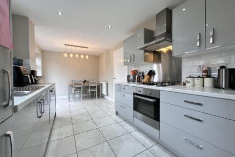 Dining Kitchen With Integrated Appliances 207