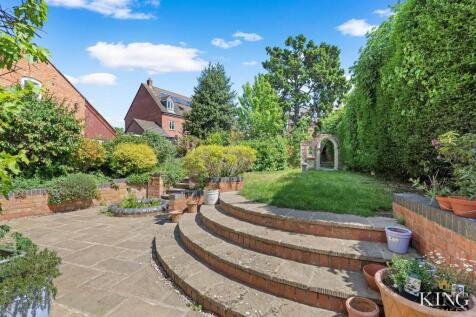 Luxury patio and landscaped gardens