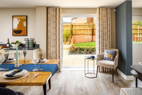 French doors from the kitchen diner are ideal for summer socialising
