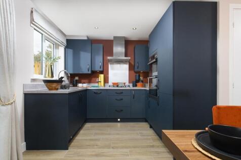 A modern kitchen with ample space for storage