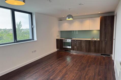 lounge kitchen mid shot.JPG