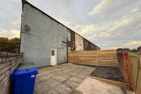 Rear Yard/Driveway