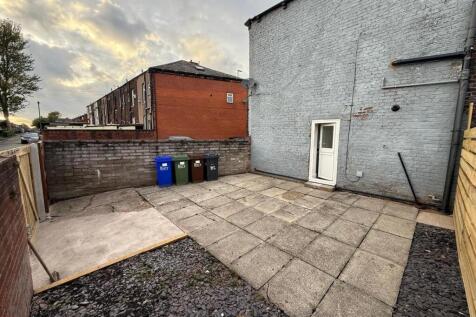 Rear Yard/Driveway