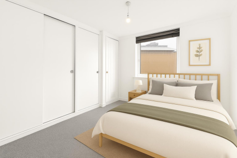 Furnished second bedroom - double bed.png