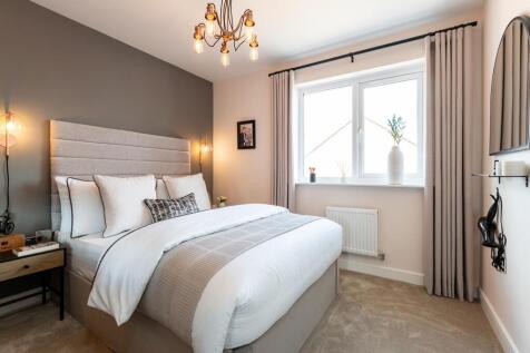 Bedroom 1 is spacious and bright