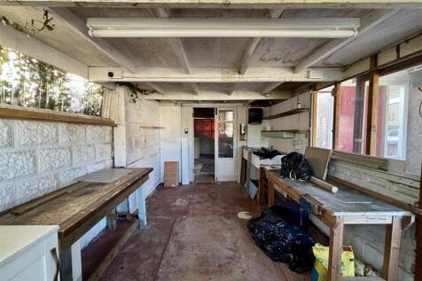 Workshop Leading To Garage