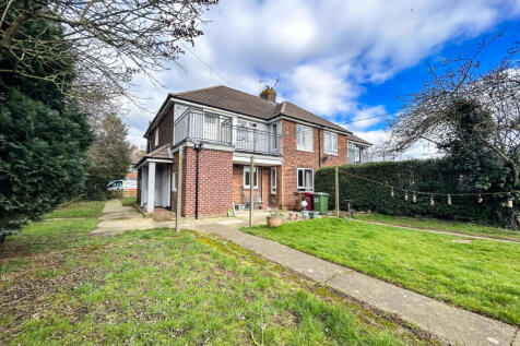 Spacious Two-Bedroom Flat with Large Plot and Off