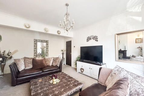 Charming Three-Bedroom Family Home with Modern Re