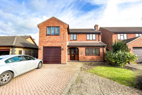 Price Drop! Stylish Four-Bedroom Detached Home in
