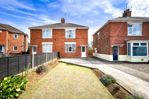Spacious Semi-Detached Home with Gardens and Off-