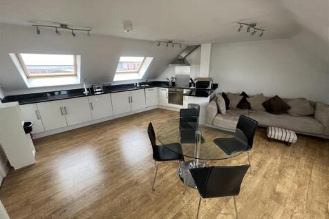 LIVING/KITCHEN AND DINING AREA