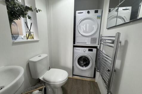 CLOAK/UTILITY ROOM