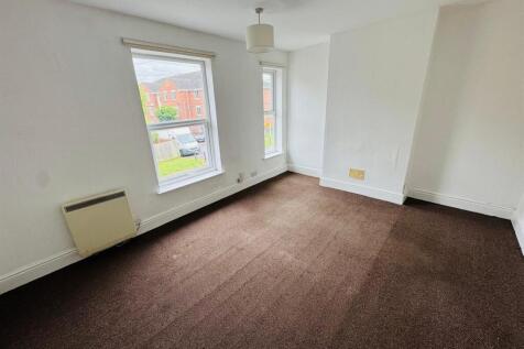 FRONT BEDROOM ONE