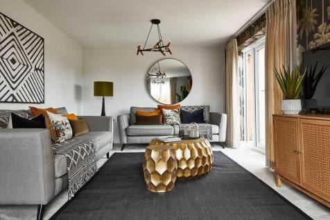 The lounge hosts double doors leading to the garden