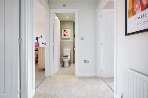 Three bedrooms sit off the landing