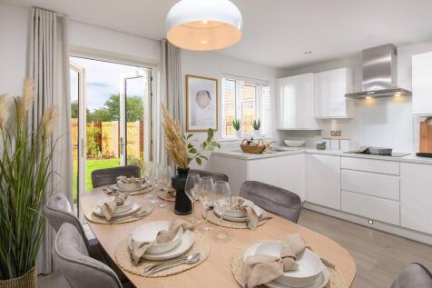 Kitchen with dining area, French doors to rear garden