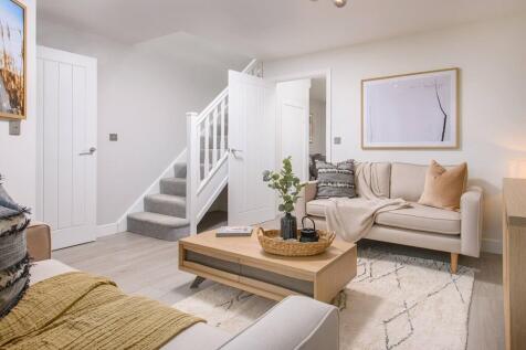 Spacious living room which leads through to the kitchen