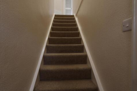 Stairs leading to first floor