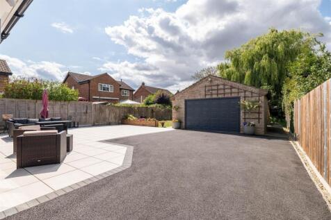 Back of house w garage.jpg