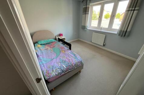 SECOND BEDROOM