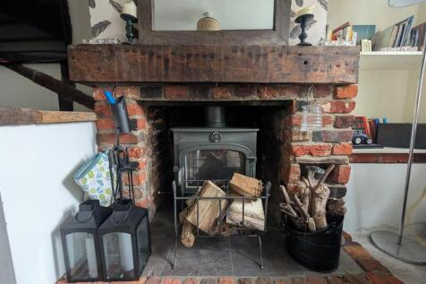 OPEN FIRE IN SITTING ROON