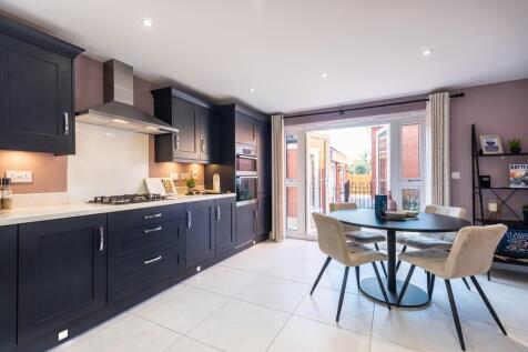 Open-plan kitchen diner with family seating space and french doors onto your rear garden