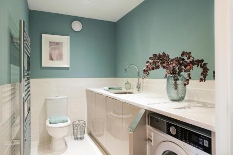 Handy cloakroom and utility room with laundry space