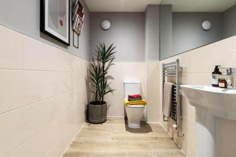 A guest cloakroom completes the ground floor