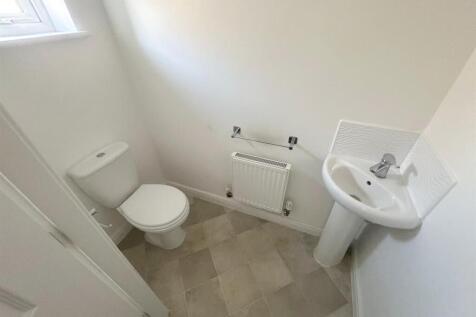 DOWNSTAIRS CLOAKS/WC