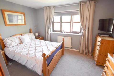 BEDROOM ONE WITH SHOWER AREA