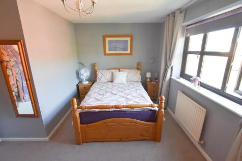 BEDROOM ONE WITH SHOWER AREA