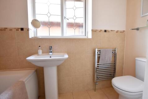 FAMILY BATHROOM WITH SHOWER OVER