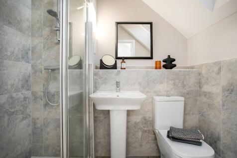 En-suite shower room away from the family