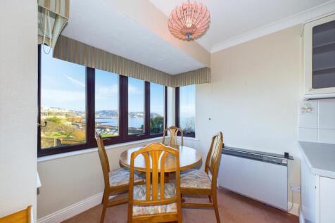 Off the kitchen is a dining area with lovely views