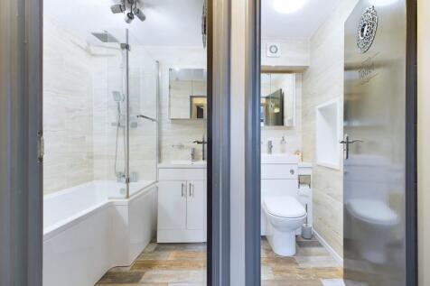 Bathroom and separate cloakroom